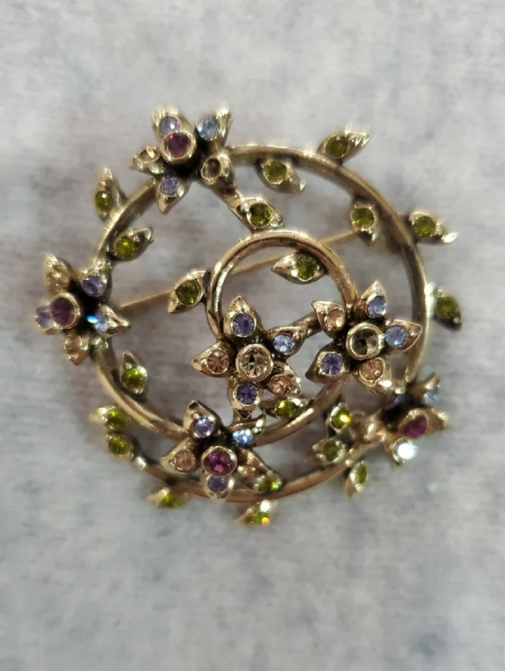 Monet Gold-Tone Floral Circle Brooch with Green, Purple, Blue Stones